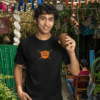 mockup-of-a-man-in-a-gildan-t-shirt-posing-in-a-street-food-market-m30300