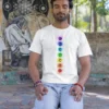 man wearing 7 chakra yoga tshirt and meditating