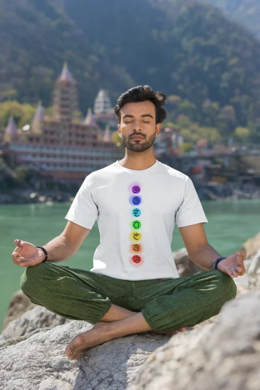 man wearing 7 chakra yoga tshirt and meditating 2